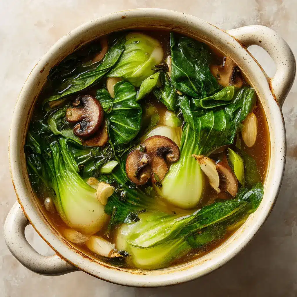 Overhead view of fresh ingredients for Bok Choy Soup including vibrant green baby bok choy and sliced mushrooms.