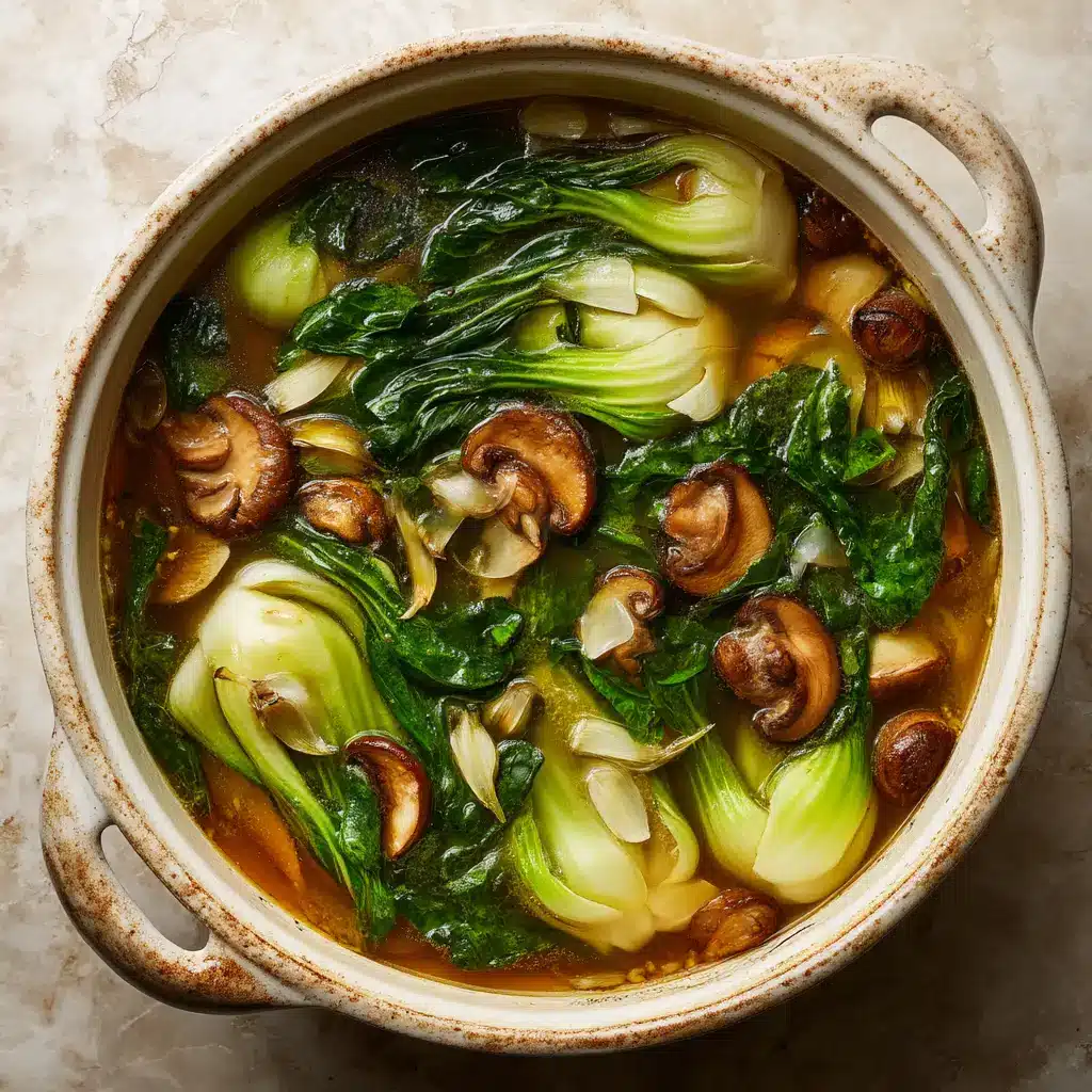 Simmering Bok Choy Soup in a rustic white ceramic dutch oven, showing a glossy golden-brown broth.