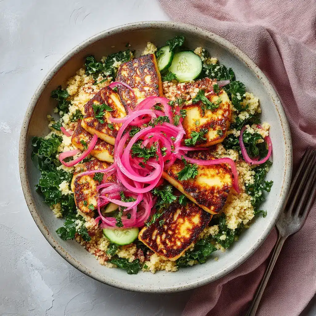 Hot Honey Halloumi Salad with a Zesty Lemon Vinaigrette 2 A close-up shot of pan-seared halloumi cheese being drizzled with a spicy honey glaze. The cheese is golden-brown and sizzling in the pan.